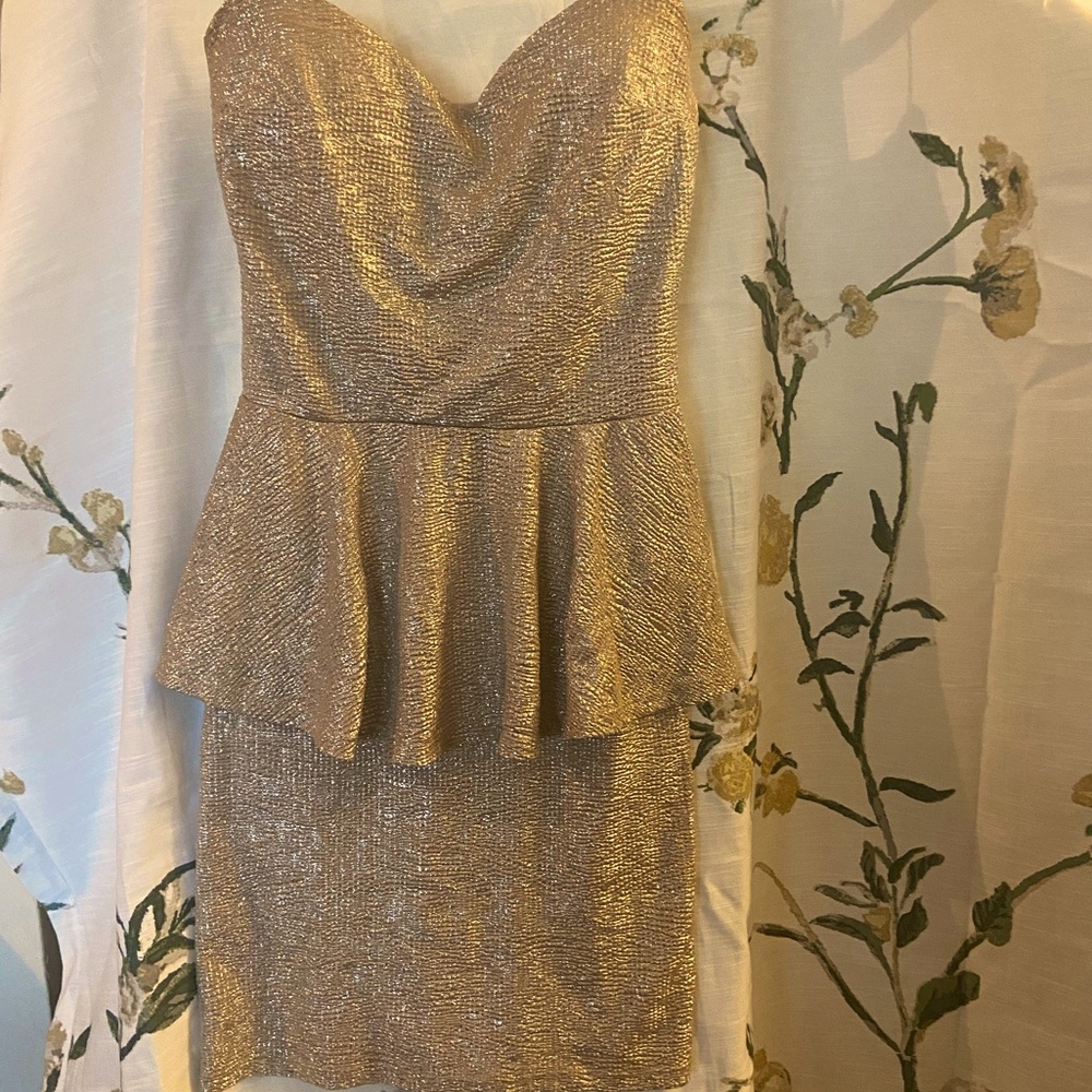Champagne gold strapless peplum dress